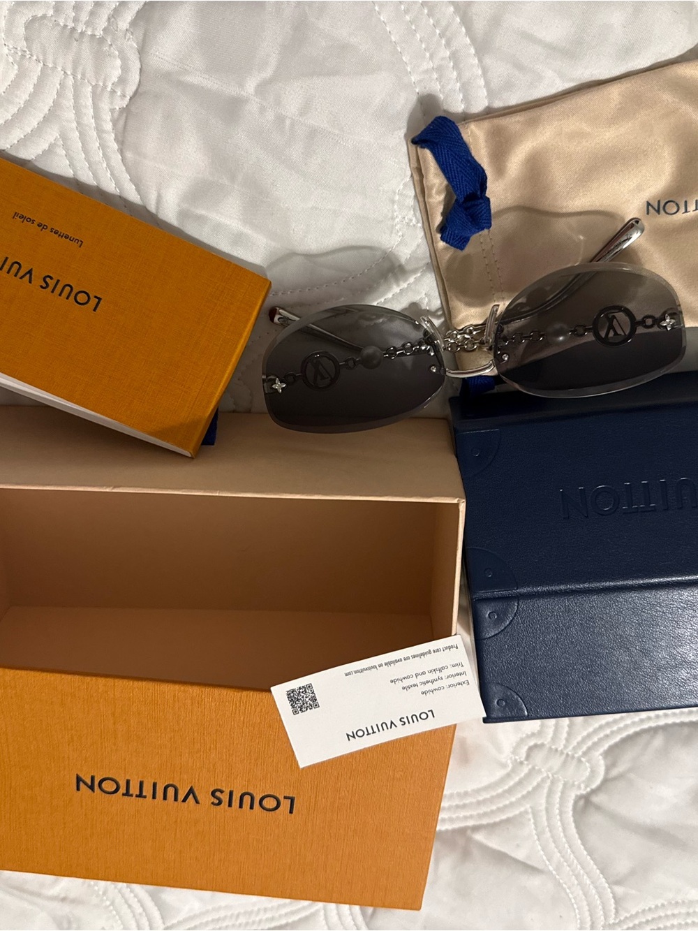 Louis Vuitton Black Oval Sunglasses with Logo Chain Detail